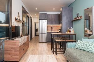 Kuchyň nebo kuchyňský kout v ubytování Blue Garden Samos Apartments + 73 fotografií