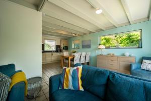 Χώρος καθιστικού στο Vakantiehuis de Schelp