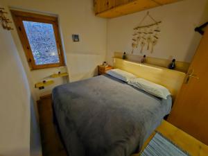 Ένα ή περισσότερα κρεβάτια σε δωμάτιο στο Casa Aiello