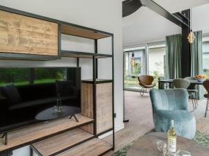 Posezení v ubytování Great holiday home energy neutral on Texel with sauna and sun shower + 32 fotografií