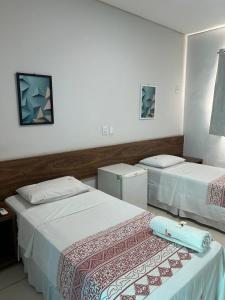 Ένα ή περισσότερα κρεβάτια σε δωμάτιο στο San Felipe Hotel