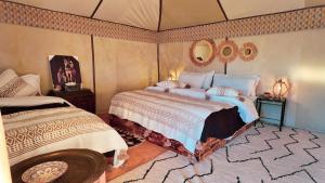 Ένα ή περισσότερα κρεβάτια σε δωμάτιο στο Moonlight Luxury Camp