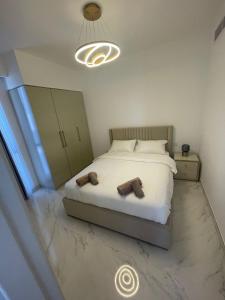 Ένα ή περισσότερα κρεβάτια σε δωμάτιο στο Dubai Hills Mahek Holiday Villa +10 φωτογραφίες