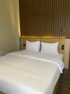 Postel nebo postele na pokoji v ubytování Moonstone