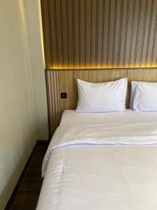 Postel nebo postele na pokoji v ubytování Moonstone