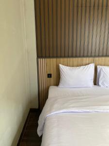 Postel nebo postele na pokoji v ubytování Moonstone