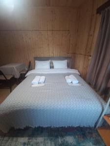 Ένα ή περισσότερα κρεβάτια σε δωμάτιο στο Sesili's apartment