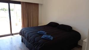 Ένα ή περισσότερα κρεβάτια σε δωμάτιο στο Casa a la Laguna BARRIO SAN SEBASTIAN AREA 10 +13 φωτογραφίες