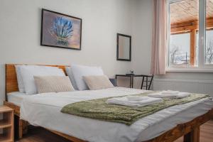 Ένα ή περισσότερα κρεβάτια σε δωμάτιο στο Guest house ''Viktoria''
