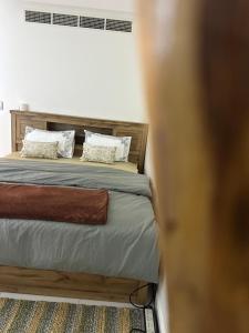 Ένα ή περισσότερα κρεβάτια σε δωμάτιο στο Sea and lake view apartment