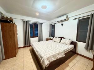 Ένα ή περισσότερα κρεβάτια σε δωμάτιο στο Fisherman Pool Villa - Koh Samui +19 φωτογραφίες