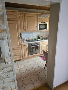 Kuchyň nebo kuchyňský kout v ubytování 1,5 Zimmer Wohnung
