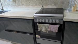 Кухня или мини-кухня в Sky Blue Apartment
 +8 фотографий