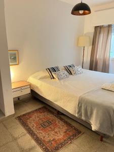 Ένα ή περισσότερα κρεβάτια σε δωμάτιο στο Casa Raíz para 4 personas frente al río