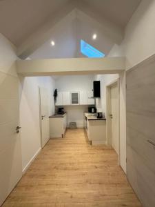 Η κουζίνα ή μικρή κουζίνα στο Le sommet virtonnais appartement 4 p sous les etoiles au coeur de la gaume