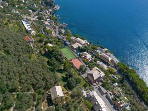 an aerial view of a house next to the water at Polanesi Sea View - Garden - AC - Free Park - Super Wi Fi in Sori
