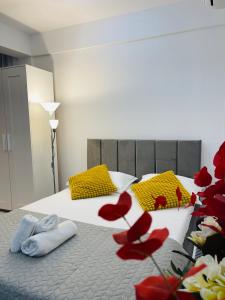 En eller flere senge i et værelse på Studio Dumy near Airport