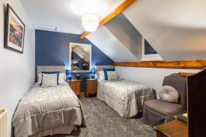 Ένα ή περισσότερα κρεβάτια σε δωμάτιο στο Brooklands 5 Star Guest House