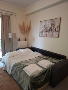 Ένα ή περισσότερα κρεβάτια σε δωμάτιο στο V & G House