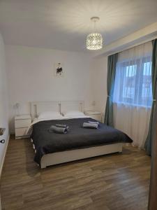 En eller flere senge i et værelse på Casa Manu