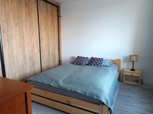 Postel nebo postele na pokoji v ubytování Przytulny Kąt