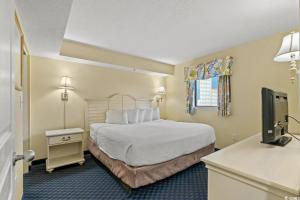 Postel nebo postele na pokoji v ubytování Ocean View 1 Bedroom for 4! Ocean Reef 1024 + 39 fotografií