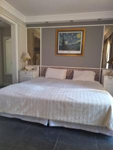 Ένα ή περισσότερα κρεβάτια σε δωμάτιο στο Landmark jardins cobertura