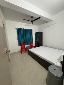 Ένα ή περισσότερα κρεβάτια σε δωμάτιο στο Party Place