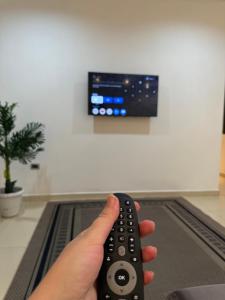 TV a/nebo společenská místnost v ubytování Posada Familiar Encarnación de Siberia Group