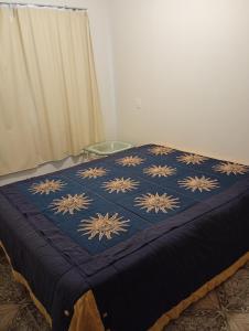 Ένα ή περισσότερα κρεβάτια σε δωμάτιο στο Casa da Márcia