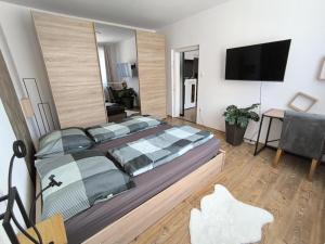 Ένα ή περισσότερα κρεβάτια σε δωμάτιο στο 4 You Apartment in Leoben mit Balkon, Garten und kostenlosen Parkplatz