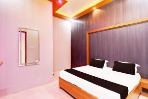 Ένα ή περισσότερα κρεβάτια σε δωμάτιο στο Hotel O Shagun palace