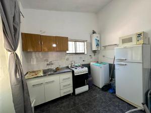 Η κουζίνα ή μικρή κουζίνα στο La Casa De Juan +2 φωτογραφίες