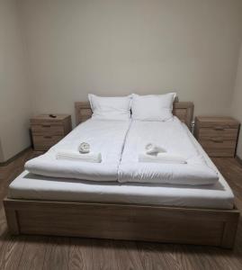 Ένα ή περισσότερα κρεβάτια σε δωμάτιο στο Апартаменти Шадравана