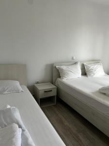 Postel nebo postele na pokoji v ubytování Gura Raului Casa de Vacanta