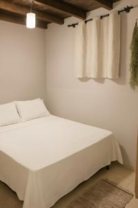 En eller flere senge i et værelse på Terraza 450 BC - Varanda - Garagem - 450m praia - Wi-Fi 500 Mbps