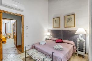 Ένα ή περισσότερα κρεβάτια σε δωμάτιο στο Amazing Berignone Natural Paradise Apt - Happy Rentals