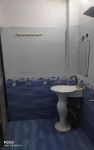 Phòng tắm tại Mahadev Guest House +12 ảnh