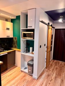 Η κουζίνα ή μικρή κουζίνα στο Cegła na Szewskiej