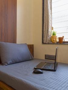 Ένα ή περισσότερα κρεβάτια σε δωμάτιο στο D Gloaming Nest