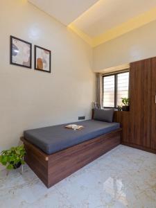 Ένα ή περισσότερα κρεβάτια σε δωμάτιο στο D Gloaming Nest