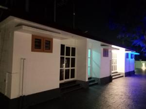 a model of a house at night at KODIVEED Heritage in Alleppey