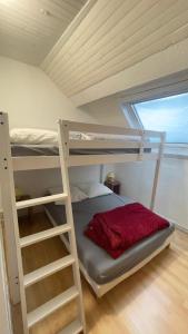 Ένα ή περισσότερα κρεβάτια σε δωμάτιο στο Résidence Bardon-Perry