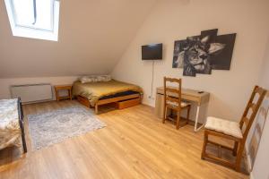 Ένα ή περισσότερα κρεβάτια σε δωμάτιο στο Maison "La Cloysienne"