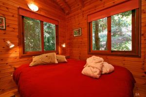 Ένα ή περισσότερα κρεβάτια σε δωμάτιο στο בית אמיתי מתת