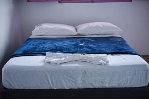 Postel nebo postele na pokoji v ubytování Posadas Jamaica