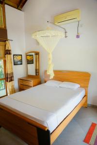 Una cama o camas en una habitación de Family Heart