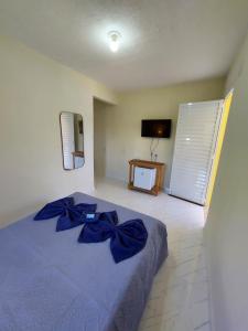 Giường trong phòng chung tại Suíte do Deca - 500M do Centro Histórico +7 ảnh