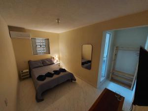 Giường trong phòng chung tại Suíte do Deca - 500M do Centro Histórico