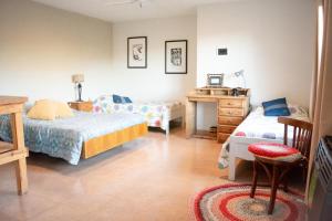 En eller flere senge i et værelse på Retiro de montaña